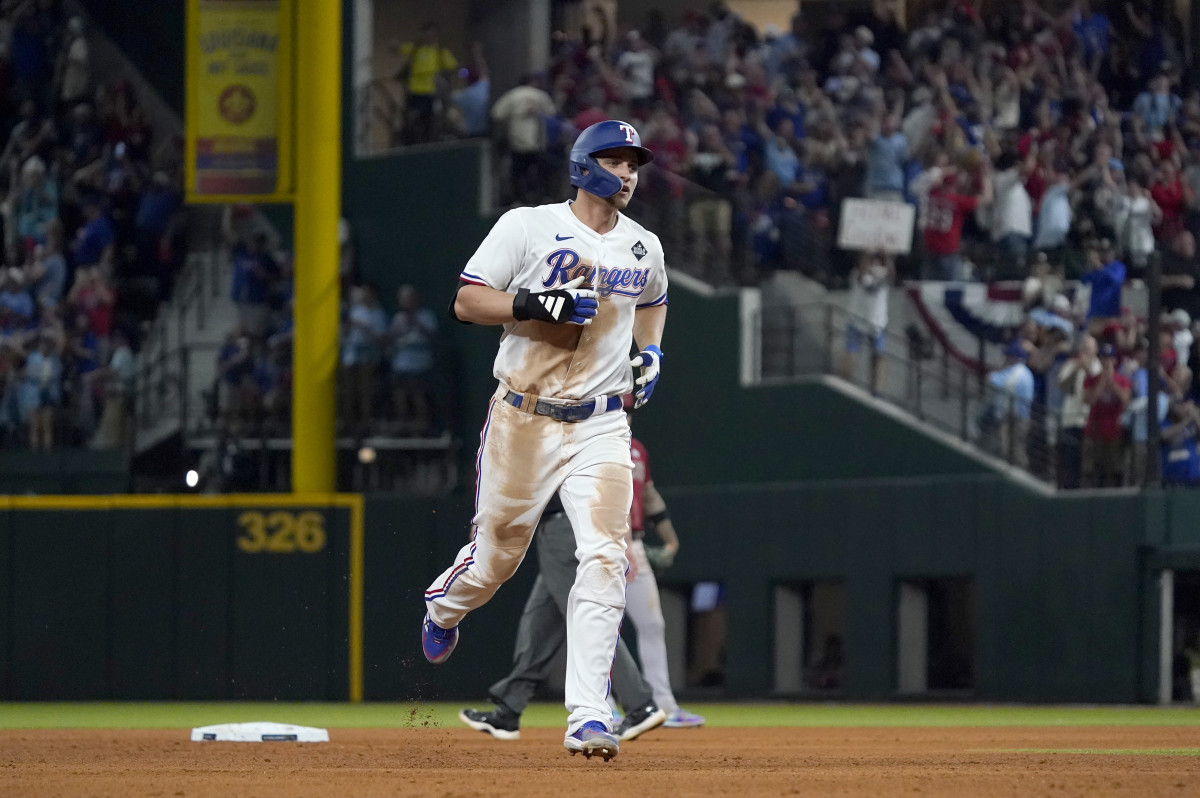 Oct 27, 2023; Arlington, TX, USA; Texas Rangers shortstop Corey Seager (5) rounds the bases after hitting a two-run home run during the ninth inning in game one of the 2023 World Series against the Arizona Diamondbacks at Globe Life Field. Mandatory Credit: Raymond Carlin III-USA TODAY Sports